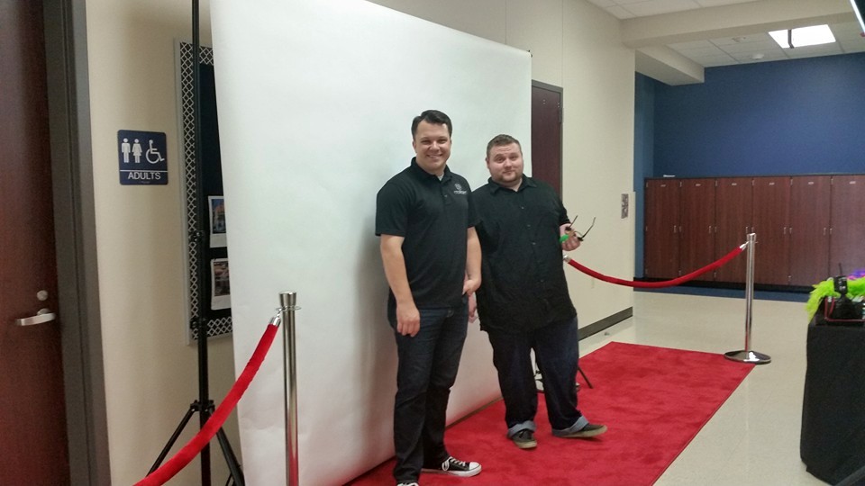 Jeremiah Brinkley Dallas Wedding DJ and Fort Worth Wedding DJ with their past employer at their first photo booth event
