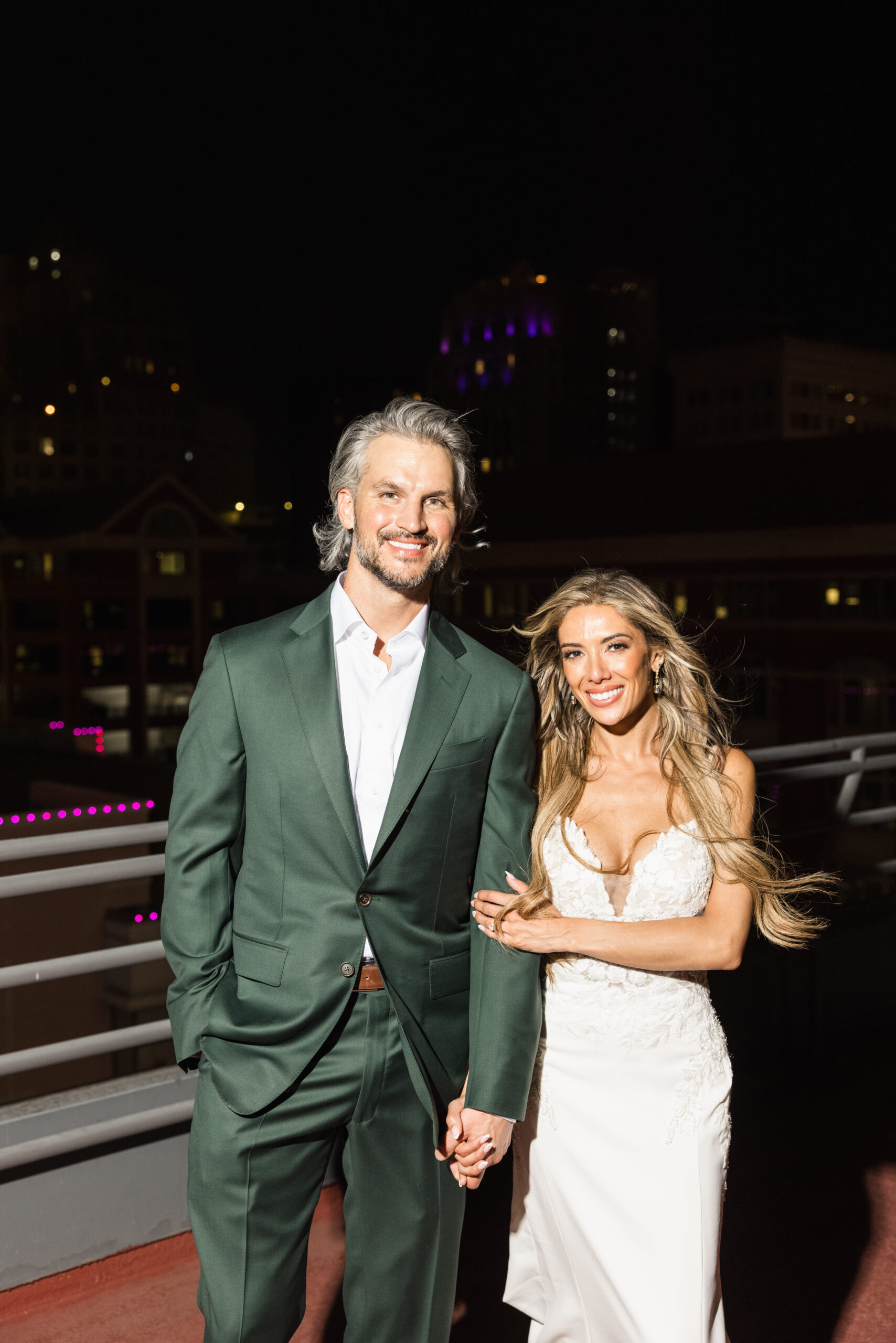 Couple in wedding attire at night with their Dallas Wedding DJ and Fort Worth Wedding DJ, Jeremiah Brinkley Music