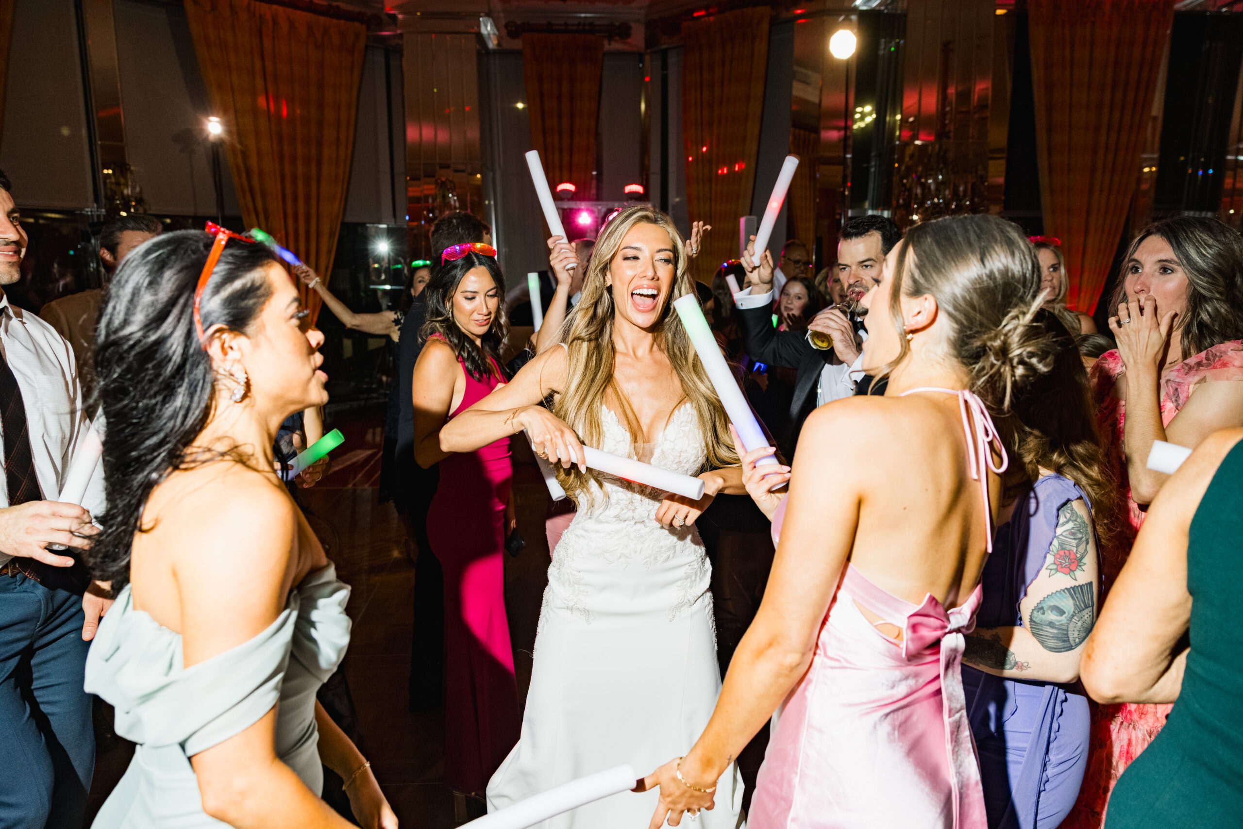 Wedding celebration with joyful dancing with their Dallas Wedding DJ and Fort Worth Wedding DJ Why your wedding DJ matters more than your playlist and how the right DJ controls the flow, energy, and success of your wedding day.