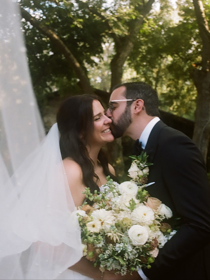Wedding couple sharing a joyful moment outdoors with their Dallas Wedding DJ and Fort Worth Wedding DJ, Jeremiah Brinkley Music